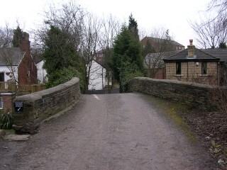 NARROW BRIDGE OVER CANAL